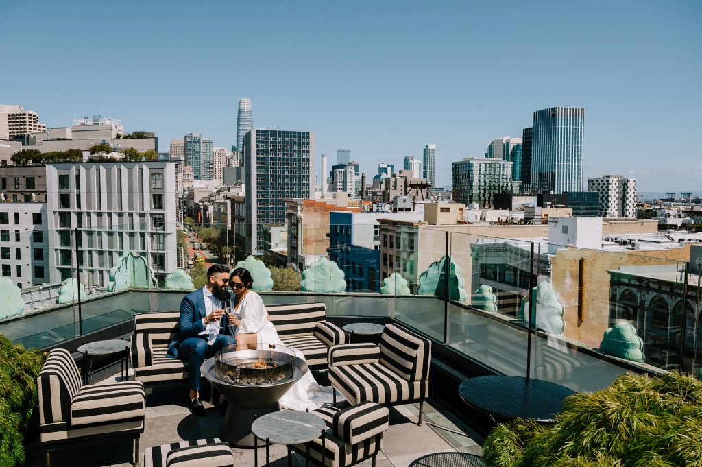 couple toasting after their wedding